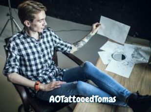 A0TattooedTomas