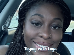 Toying_with_toya